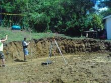 Preparing the ground to start building a retaining wall - Extreme Excavation